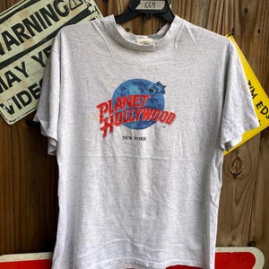 Vintage 90s single stitch Planet Hollywood New York Tshirt Size L