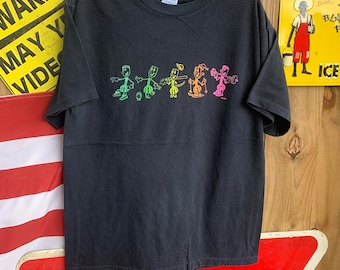 Camiseta vintage de los 90 con dibujos animados deportivos, talla L.