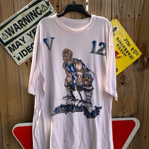 Rara camiseta con estampado grande de Vince Carter Anger Management de los años 90. Talla 5XL según las medidas.