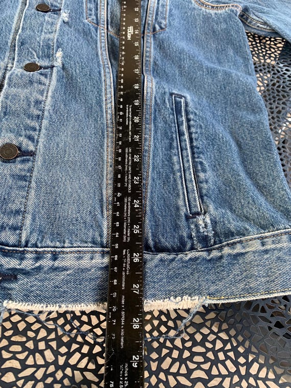 Vintage Y2K Levi's Denim Jacket With a Distressed, Worn-in Look