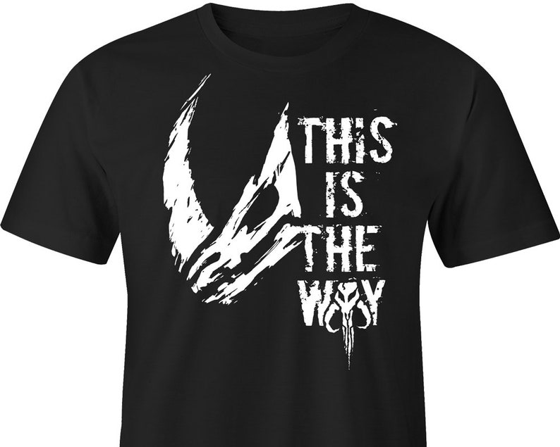 May include: Black t-shirt with a white graphic of the Mandalorian symbol and the text "This is the Way".