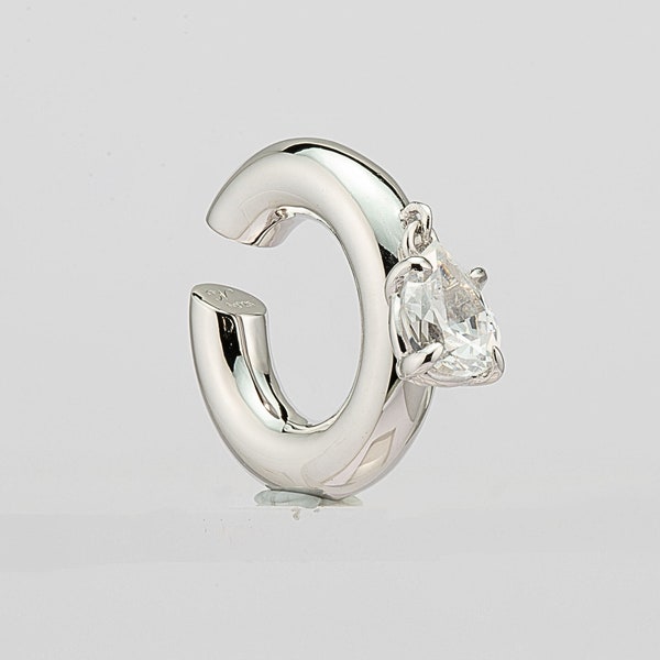 Chunky 925 sterling silver ear cuff with floating zirconia pear stone bathed in rhodium, made by Noora Aurès