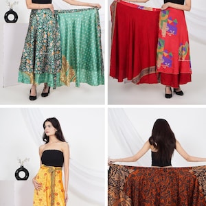 Puede incluir: Una colección de cuatro faldas cruzadas con varios patrones y colores, incluyendo verde floral, rojo con formas geométricas, amarillo con pequeños motivos florales y un estampado complejo en marrón oscuro y negro, usadas con un top negro.