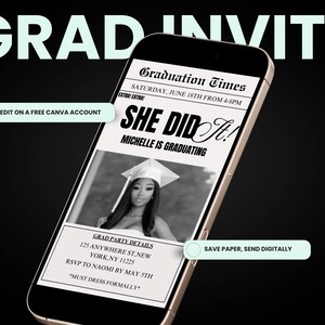 May include: A smartphone screen displaying a graduation invitation with a black and white photo of a woman wearing a graduation cap and gown. The text on the screen reads "Graduation Times", "She Did It!", "Michelle is Graduating", and "Save Paper, Send Digitally".
