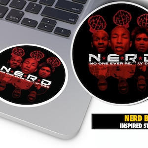 May include: A round sticker with a black background and red text. The text reads "NERD" with the words "NO ONE EVER REALLY DIES" below. Three men's faces are visible, each with a red brain above their head.