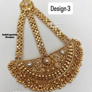 May include: A gold-toned headpiece featuring three floral-patterned chains connected to a semi-circular pendant with intricate embossed floral motifs, small white stones, and dangling gold beads. The text Design 3 and IndoExquisite Designs are visible.