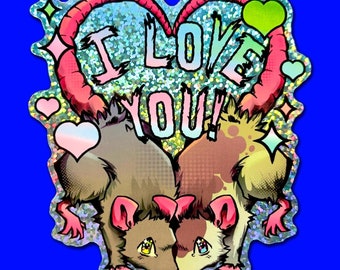 May include: A sticker with two cartoon rats in a heart shape with the text "I LOVE YOU!" in pink and blue letters. The rats are brown and gray with pink ears and noses. The background is a blue glitter pattern.