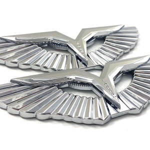 Emblema cromato Anzu Wing Badge: sostituzione Kia 2022-2026