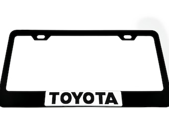 Marco de matrícula de acero inoxidable negro satinado para TOYOTA con emblema de placa cromado/negro