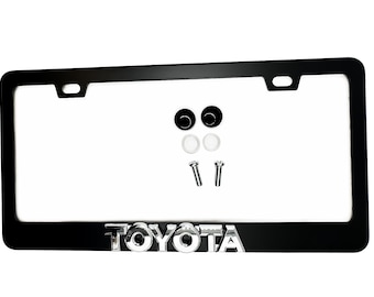 Emblema de acero inoxidable con marco para matrícula de color negro satinado para TOYOTA con logotipo cromado