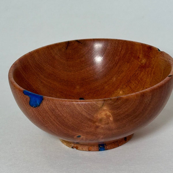 Hand turned Texas sweet acacia bowl.  Worm holes filled with blue epoxy for stunning effect.  Small: 3.75X1.75. Perfect for candy, snacks.