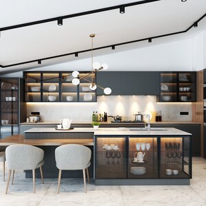 May include: Modern kitchen design featuring dark gray cabinetry, a large island with seating, and a wooden dining table. The space is illuminated by recessed lighting and a stylish chandelier. Glass-fronted cabinets display dishware.