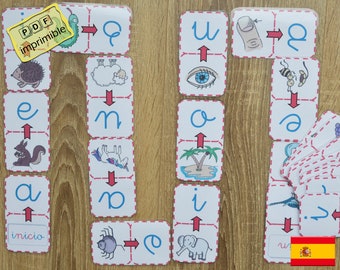 Op de afbeelding: Educatieve dominostenen met illustraties en letters. De dominostenen bevatten afbeeldingen van een worm, egel, eekhoorn, schaap, eenhoorn, spin, oog, palmboom, olifant en een nagel. De tekst "PDF imprimible" is zichtbaar.