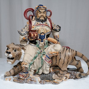 Chinese Earthenware Figure of Wu Song riding a Tiger