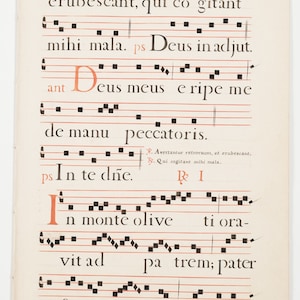 May include: A page from a vintage music book with handwritten musical notation and lyrics in black ink on a cream-colored page. The lyrics include the words "erubescant, qui co gitant mihi mala. ps Deus in adjut. ant Deus meus eripe me de manu peccatoris. ps In te dne. I n monte olive ti ora- vit ad pa trem; pater si fieri po teft, transeat"