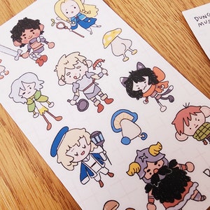 May include: A sheet of stickers featuring cartoon characters in various poses. The characters are dressed in different outfits and have different hairstyles. The stickers are on a white background with a grid pattern. The text "Dungeon Mushroom" appears in the top right corner of the sheet.