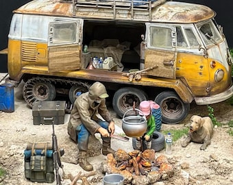 May include: A detailed diorama of a yellow and white vintage van modified with tank treads, parked near a campfire. Figures are gathered around the fire, with a dog nearby. The van has a roof rack with supplies.
