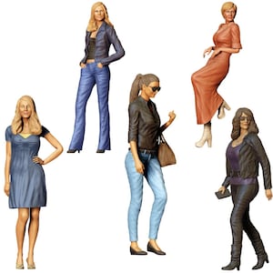 May include: A collection of miniature figurines depicting women in various outfits. The figures are dressed in casual and semi-formal attire, including jeans, jackets, dresses, and heels. The color palette includes blue, black, brown, and orange.