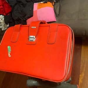 Vintage red leather suitcase