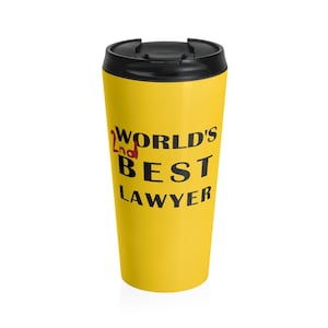May include: Yellow travel mug with a black lid and the text "World's 2nd Best Lawyer" in black lettering.