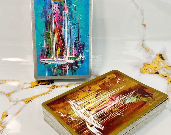 double deck playing cards - from “CONGRESS” - 1 deck is still in cellophane - both have 2 jokers - international/english pattern - vintage