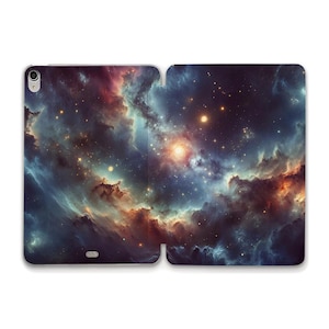 May include: A tablet case displaying a colourful nebula design with swirling blues, oranges, and purples. The case opens to reveal the full artwork, showcasing a cosmic scene with bright stars and celestial clouds. The case is designed to protect the tablet.