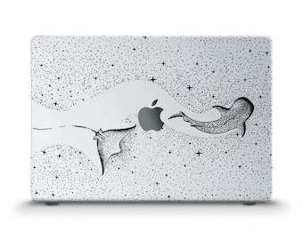 May include: A white laptop case featuring a black and white illustration of a stingray, whale shark, and an apple. The design is set against a starry background, creating a celestial theme. The case is designed to fit a laptop.