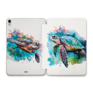 May include: A white tablet case with a watercolor design of two sea turtles swimming in the ocean. The turtles are green, blue, and brown with a splash of pink and orange in the background.