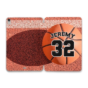 May include: Orange basketball with black text "JEREMY 32" on a red and white basketball court background.