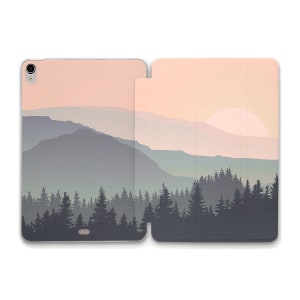 May include: A pink and blue sunset over a mountain range with a forest of pine trees in the foreground. The image is printed on a tablet case.