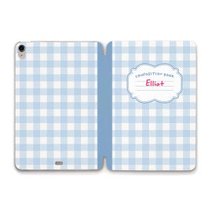May include: A light blue and white chequered tablet case featuring a central label with a decorative border. The label contains the text "COMPOSITION BOOK" in blue and the name "Elliot" in pink, with two blank lines below for additional writing.