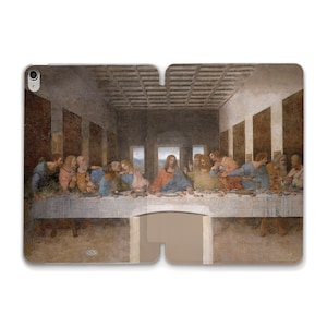 Peut inclure: Une peinture représentant La Cène de Léonard de Vinci. La peinture montre Jésus-Christ et ses 12 disciples assis à une table, avec une fenêtre en arrière-plan.