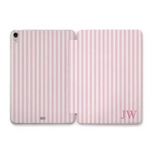 May include: A pink and white striped tablet case, open to display the interior. The case has a vertical stripe pattern and the initials "JW" are visible on the right side. The case is designed to protect a tablet.