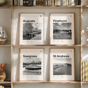May include: Four rectangular wall art prints featuring black and white photography of famous golf courses. Each print displays the course name, Augusta, Pinehurst, Sawgrass, or St Andrews, with descriptive text details below the images in a clean layout.