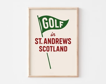 May include: A printable poster with a green golf flag with the word "GOLF" in white letters. The text "in ST. ANDREWS SCOTLAND" is in red letters below the flag.