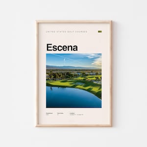 May include: A framed print featuring a golf course landscape with a lake and green fairways. The print includes the text "Escena" in bold black letters, and "United States Golf Courses" above. The print is in a light wood frame.