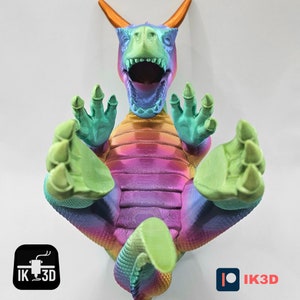 May include: A 3D printed rainbow dragon figurine with its mouth open and its arms and legs outstretched. The dragon is made of a multi-colored filament, with shades of green, blue, purple, and yellow.