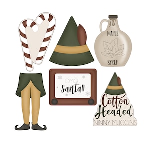 May include: A collection of Christmas-themed cookie cutters. Includes a candy cane, elf hat, maple syrup bottle, elf legs, a sign that says "OMG! santa!!", and a sign that says "Cotton Headed Ninny Muggins".