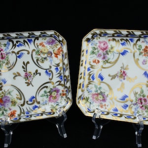 Pair of octagon Limoges porcelain floral decor gilded dishes