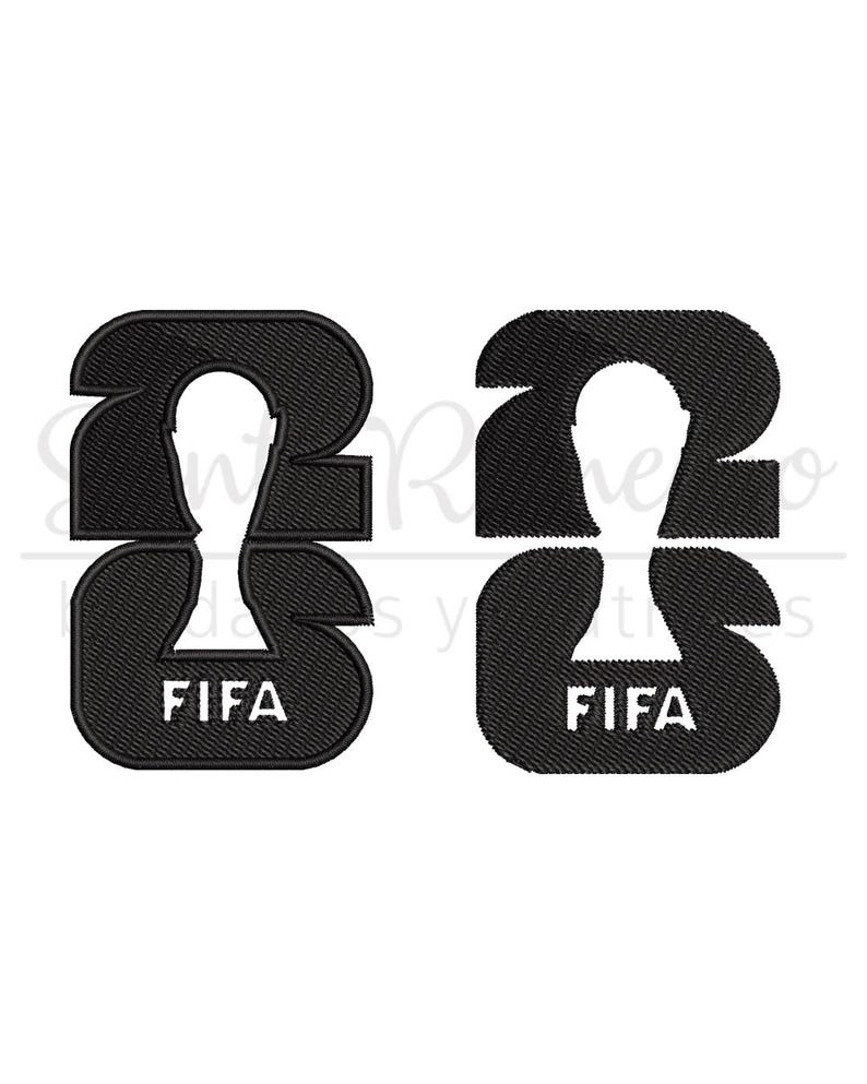 May include: Two black embroidered designs featuring the number 23 with a white silhouette of a person in the center. The word "FIFA" is embroidered in white at the bottom of each design.