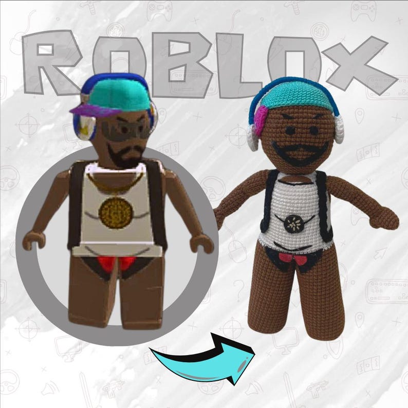 May include: A crocheted Roblox character plush toy with brown skin, a white tank top, red shorts, and blue headphones. The plush toy is standing next to a digital illustration of a Roblox character with the same features.