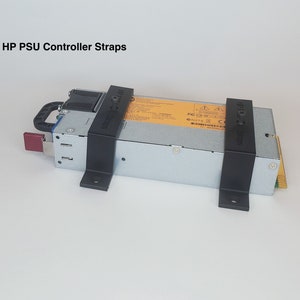 May include: Black plastic straps for securing an HP PSU controller. The straps are labeled "HP PSU Controller Straps".