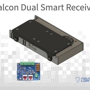 May include: A black Falcon Dual Smart Receiver with a circuit board and two RJ45 ports. The receiver is a component for controlling LED lights.