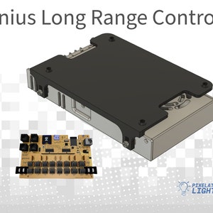 May include: A black and silver electronic device with a circuit board visible. The device is labeled "Genius Long Range Controller" and has a small fan on the side. The circuit board has a number of connectors and a small chip labeled "GN".