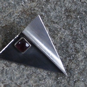Silver stud earrings with garnet