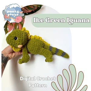 May include: A plush green iguana toy with a yellow spiky crest along its back and a striped tail. The text Ike Green Iguana and Digital Crochet Pattern is visible. The toy has a soft, textured appearance with a small peach-colored snout.