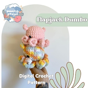 Puede incluir: Un patrón de crochet digital para un juguete amigurumi de pulpo rosa y multicolor. El patrón se llama "Flapjack Dumbo".