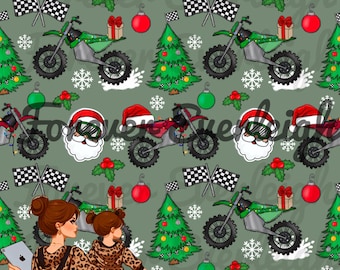 May include: A green and white motocross bike with Christmas lights, a Christmas tree, a Santa Claus head, and a red and white checkered flag on a green background. There are also snowflakes, holly, and red ornaments.