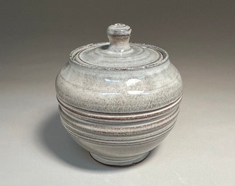 Covered jar, 6 1/2 inches tall, stoneware