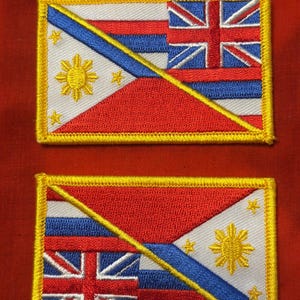 May include: Two embroidered patches with the flags of the Philippines and Hawaii, each with a yellow border. The flags are sewn together diagonally, with the Philippine flag on top and the Hawaiian flag on the bottom. The patches are on a red background.